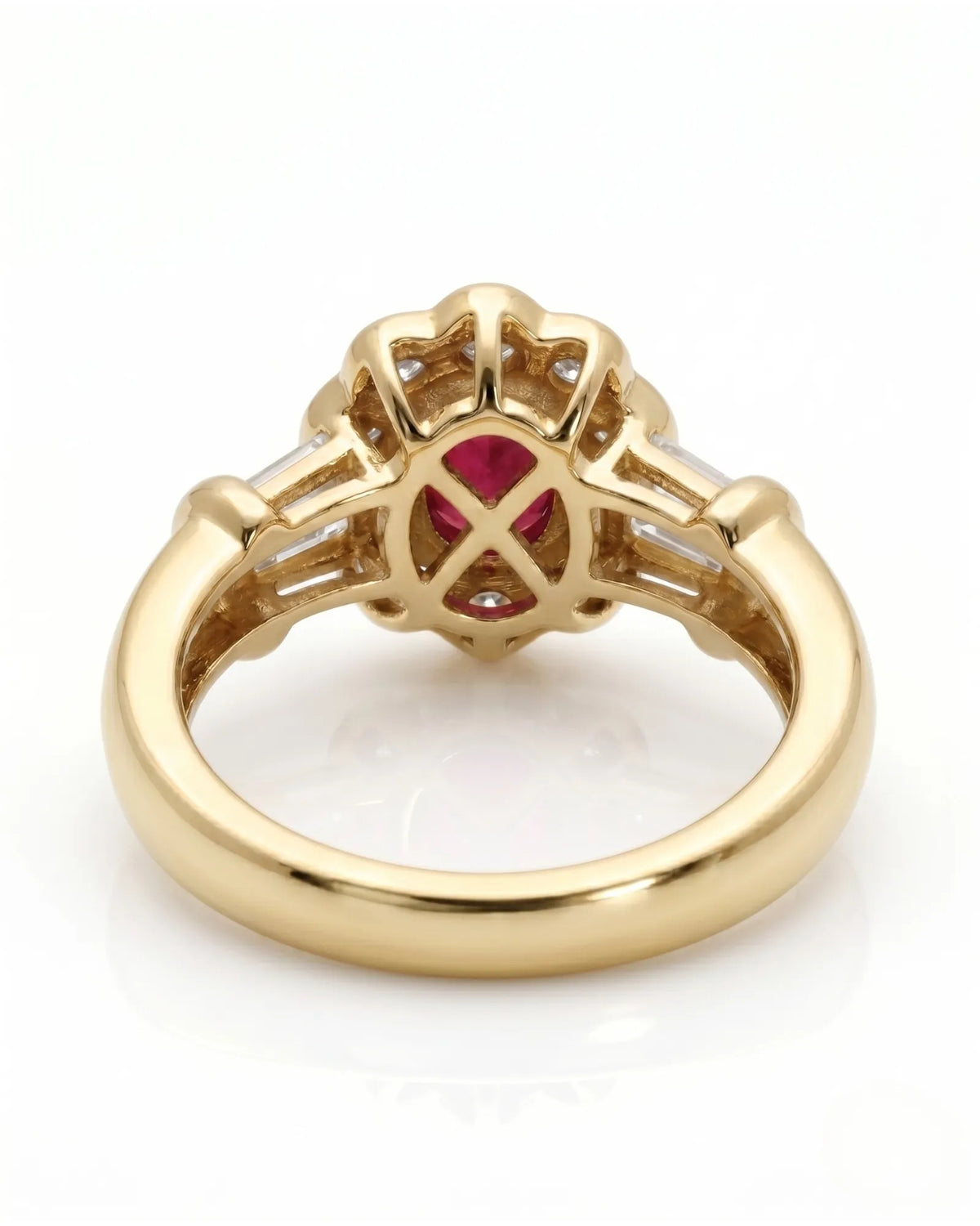 Luxury oval ruby halo ring with diamond accents in refined yellow gold | SARATTI