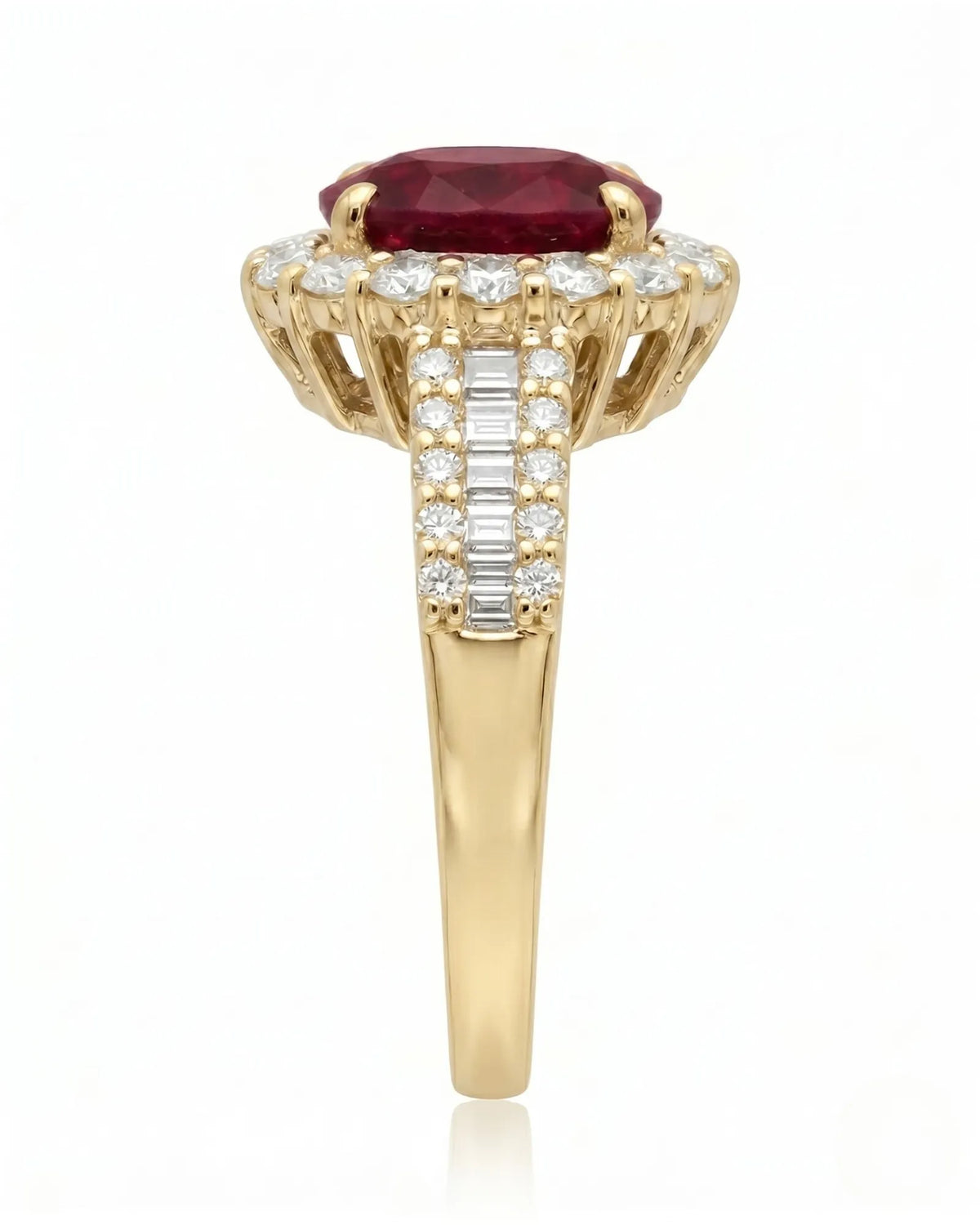 Luxury oval ruby halo ring with diamond shoulders in refined yellow gold | SARATTI