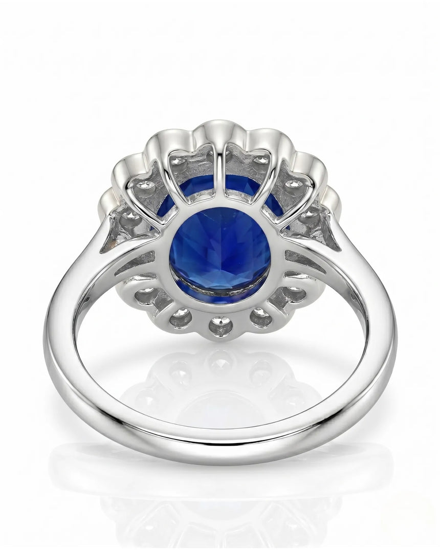 Luxury oval sapphire cocktail ring with diamond halo in 18K white gold | SARATTI
