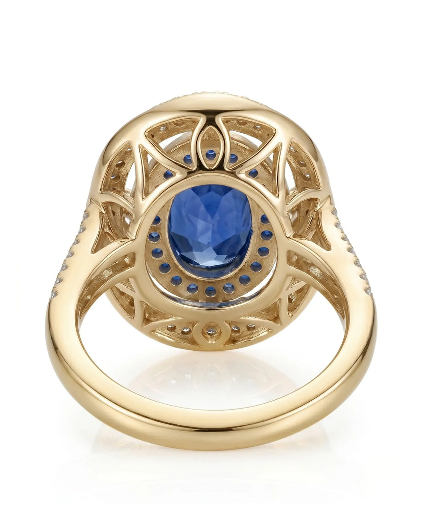 Luxury oval sapphire cocktail ring with diamond halo in 18K yellow gold - SARATTI