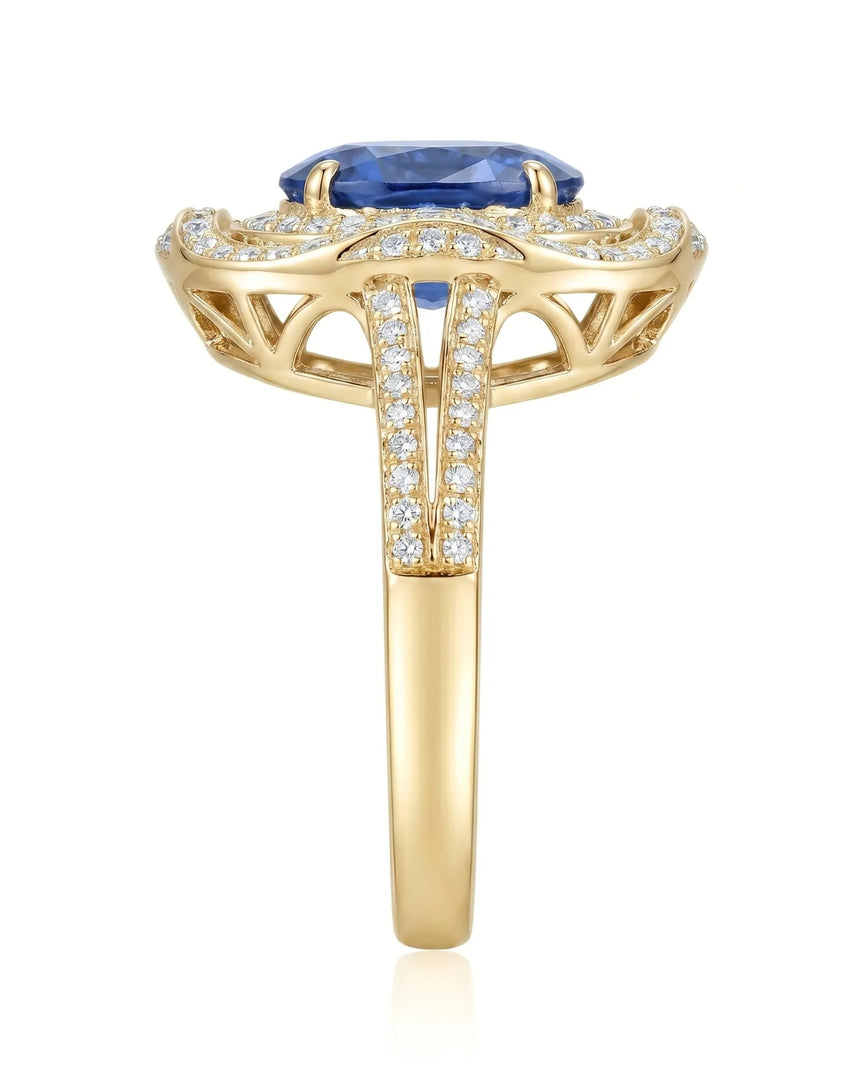 Luxury oval sapphire cocktail ring with diamond halo in 18K yellow gold | SARATTI