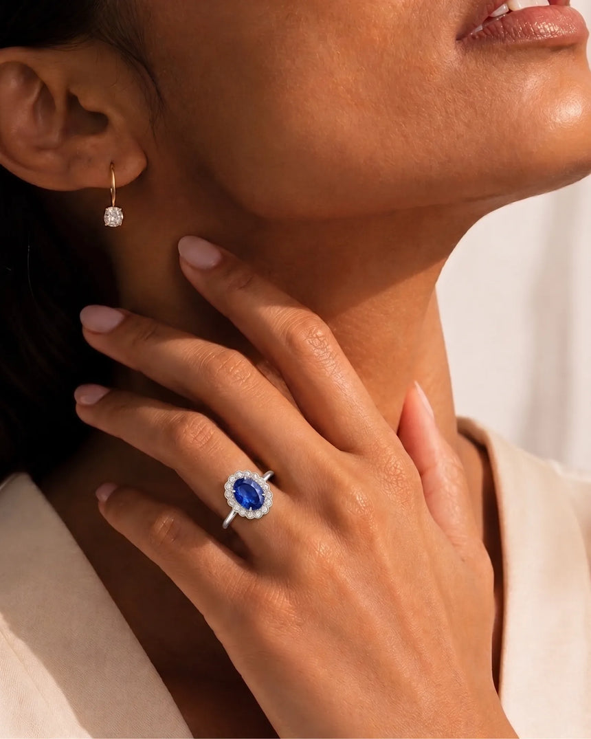 Luxury oval sapphire cocktail ring with diamond halo in platinum - SARATTI