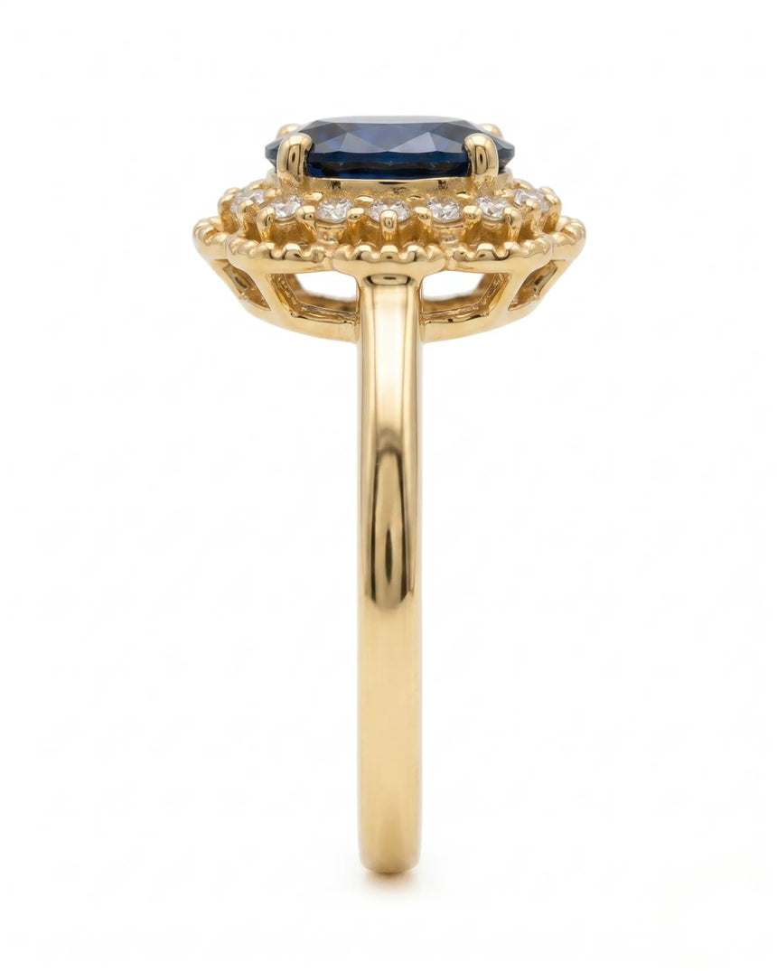 Luxury oval sapphire diamond ring crafted in rich 18K yellow gold | SARATTI