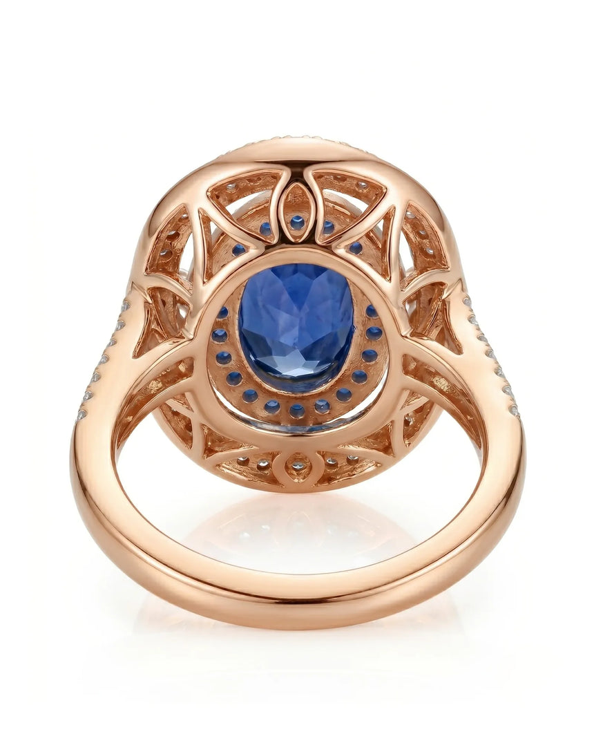 Luxury oval sapphire statement ring with diamond halo in 18K rose gold | SARATTI