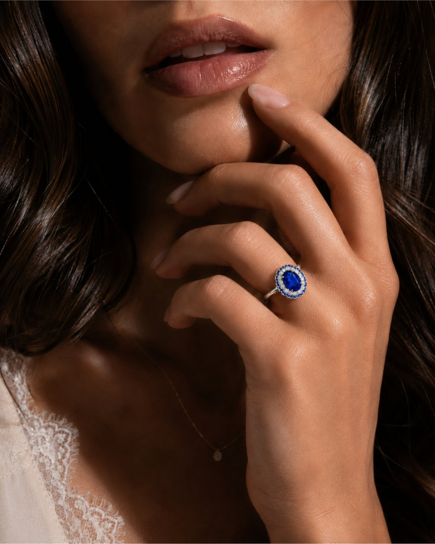 Luxury oval sapphire statement ring with double halo design in polished platinum - SARATTI
