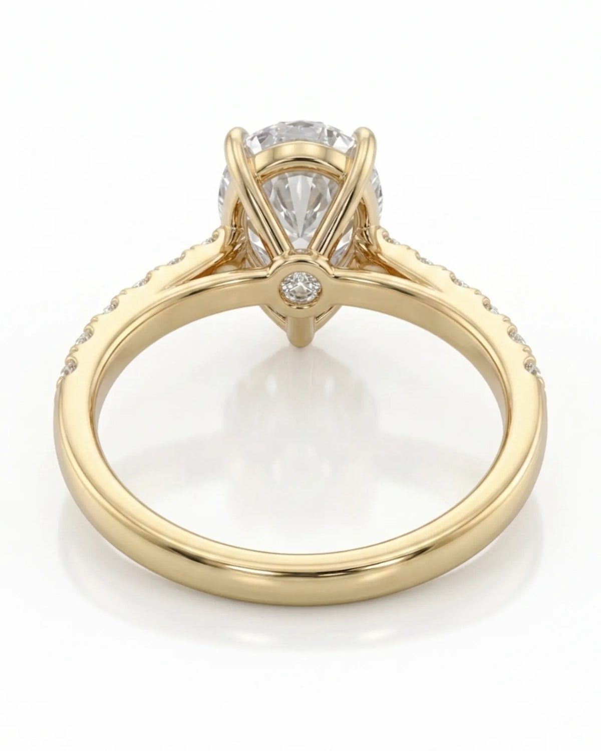 Luxury pear cut moissanite ring with detailed gallery and luminous accents in 18K yellow gold | SARATTI