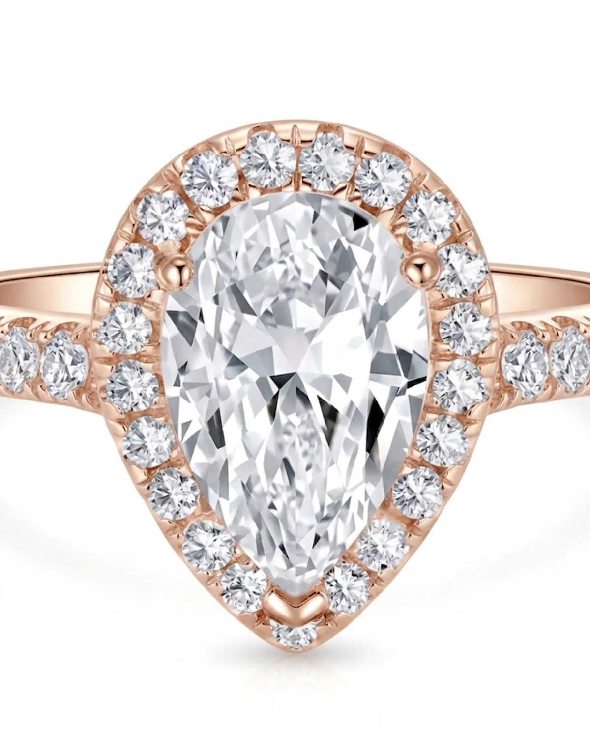 Luxury pear halo moissanite ring combining brilliant accents with warm rose gold elegance | SARATTI
