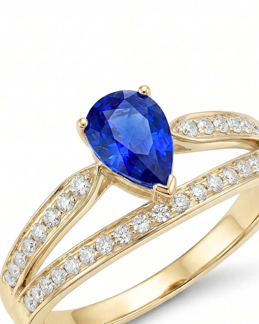Luxury pear sapphire split shank ring with diamond accents in 18K yellow gold | SARATTI