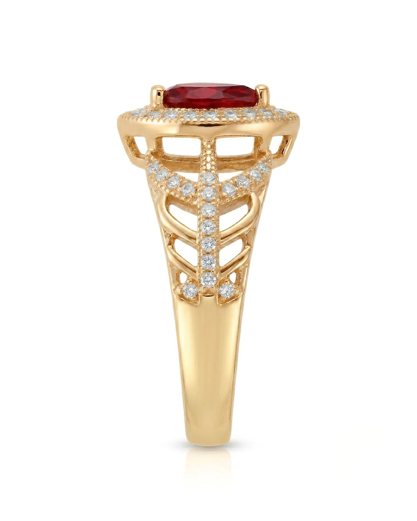 Luxury pear shaped ruby ring with diamonds in polished 18K yellow gold | SARATTI