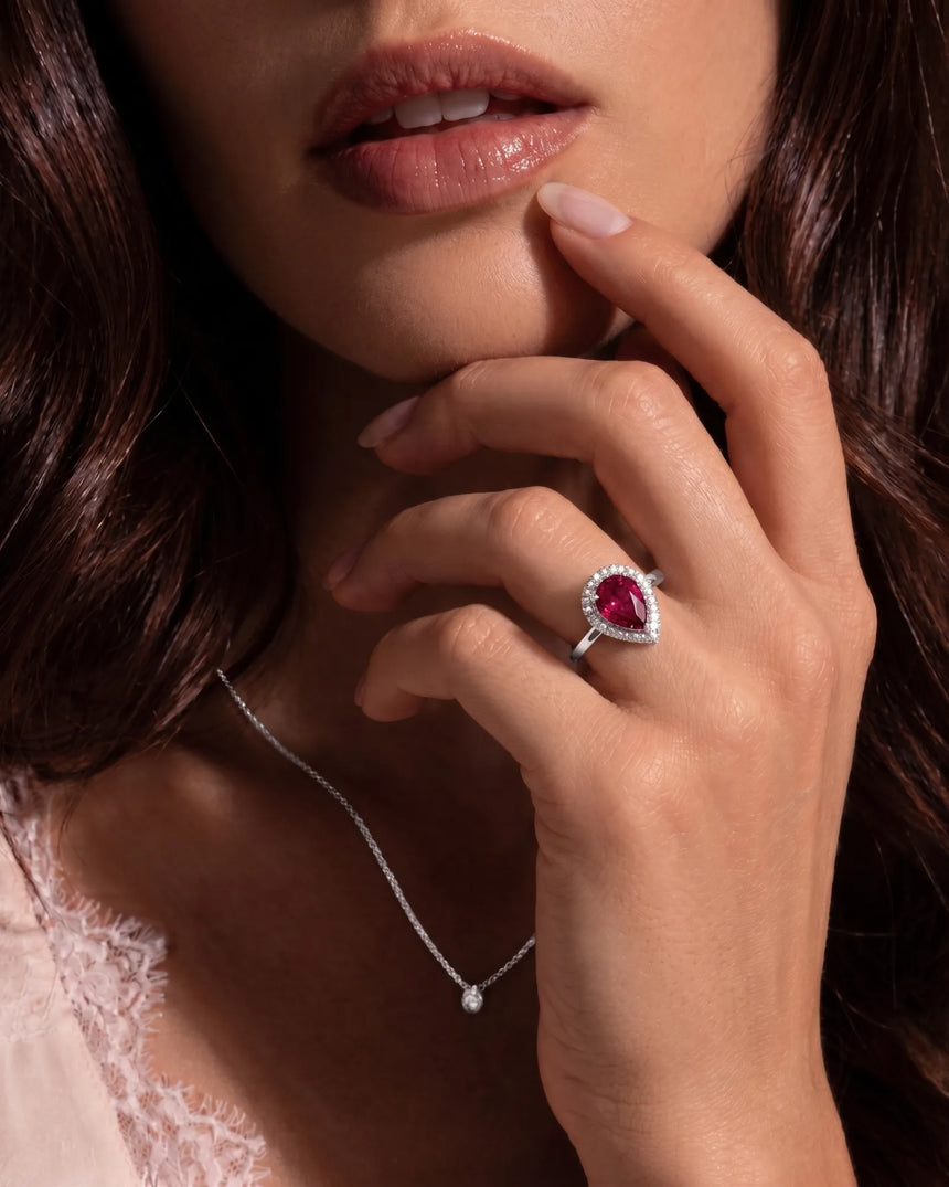 Luxury red-pink tourmaline ring with pear shape and diamonds in platinum | SARATTI