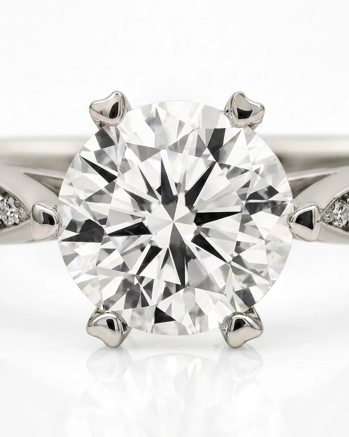 Luxury round moissanite ring with elevated profile and precise platinum craftsmanship | SARATTI