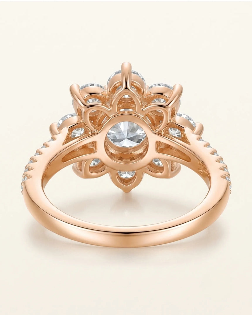 Luxury round moissanite ring with flower-inspired cluster and refined 18K rose gold craftsmanship | SARATTI