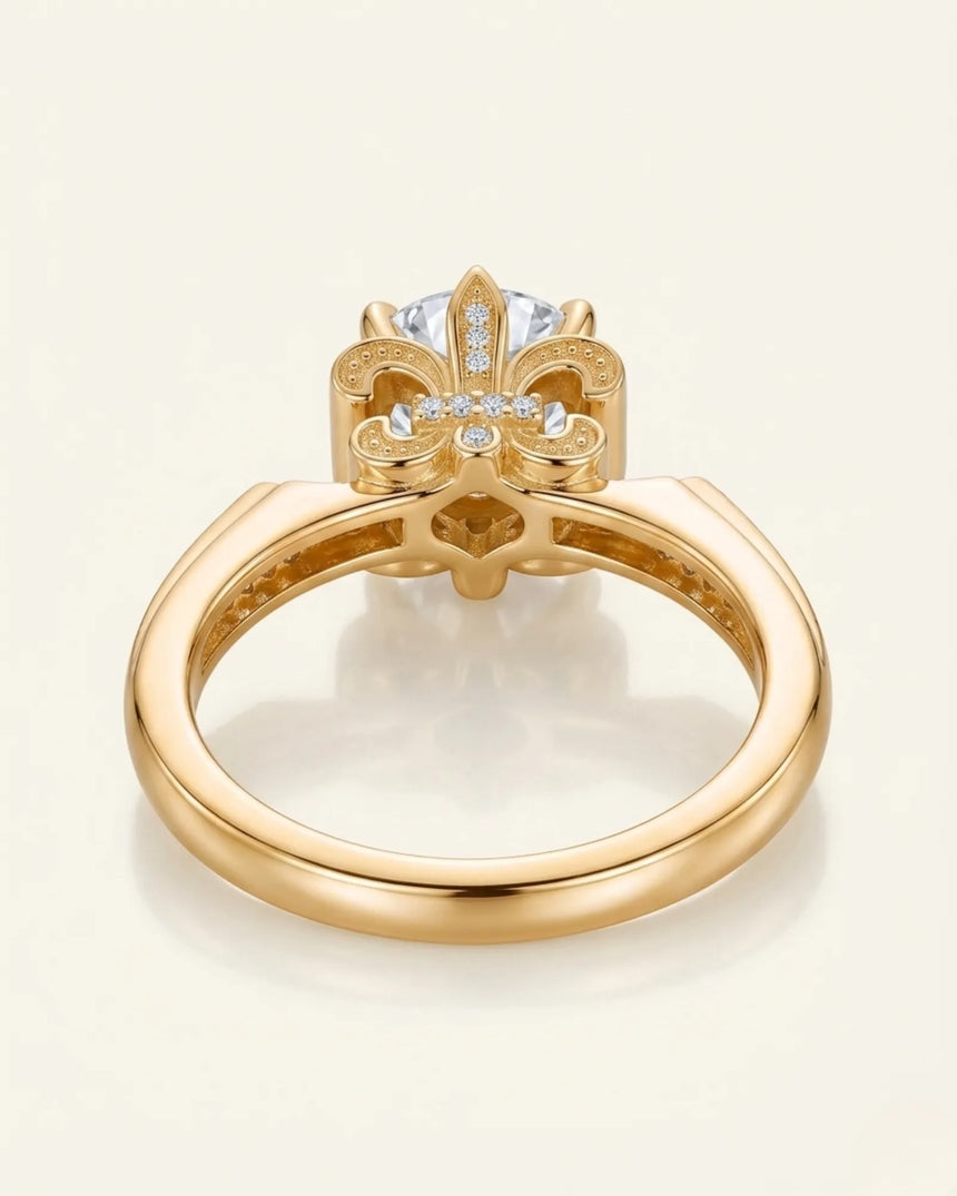 Luxury round moissanite ring with pavé accents and ornamental fleur-de-lis gallery crafted in 18K yellow gold - SARATTI