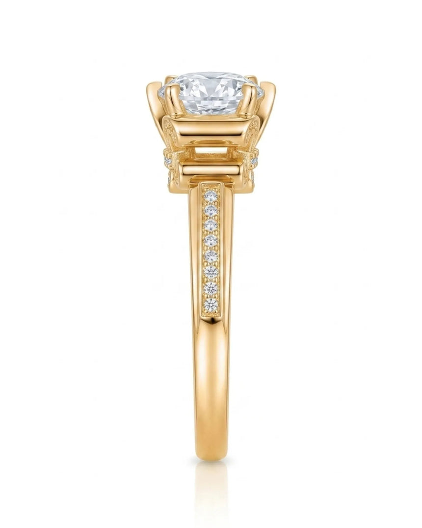 Luxury round moissanite ring with pavé accents and ornamental fleur-de-lis gallery crafted in 18K yellow gold | SARATTI