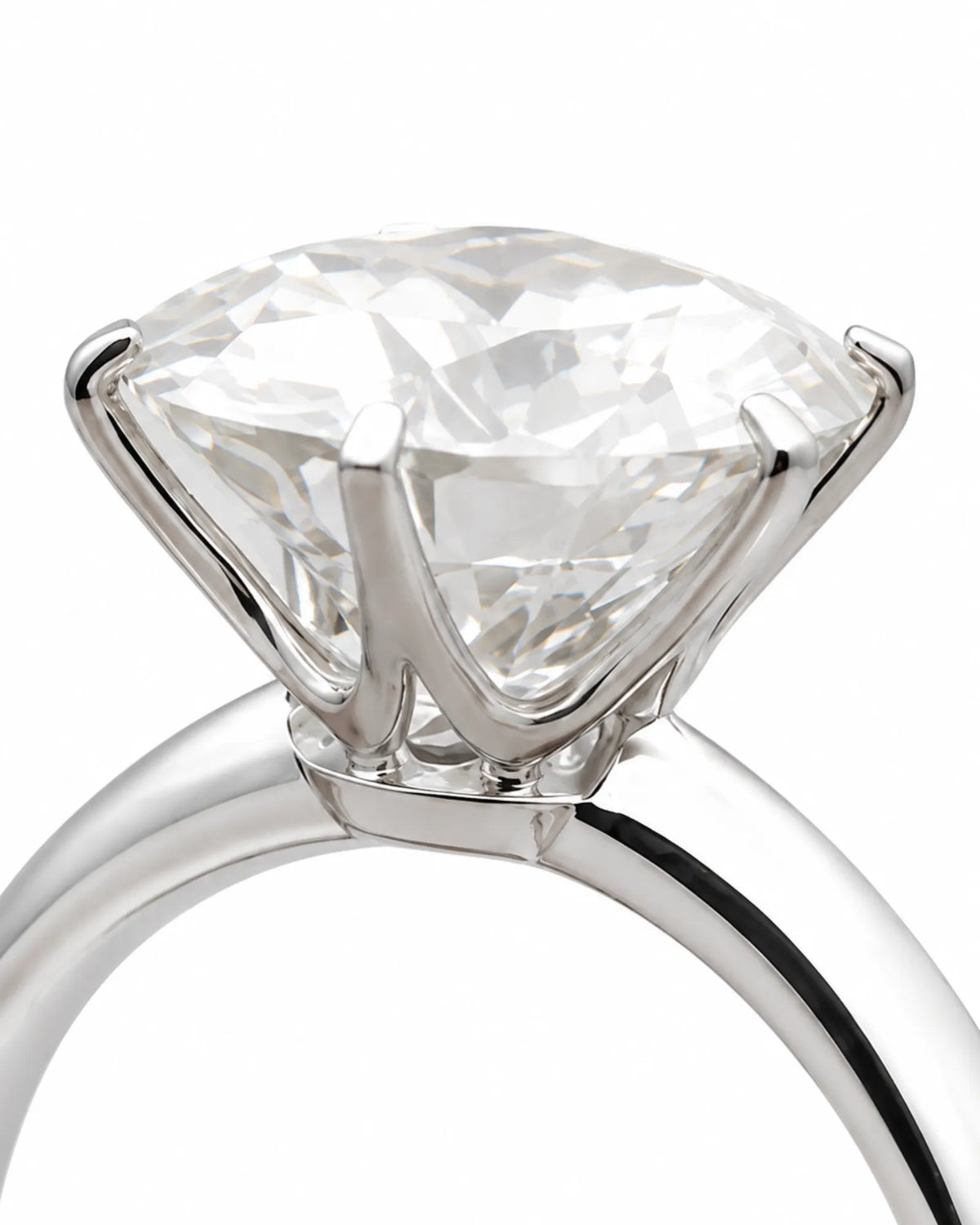 Luxury round moissanite statement ring with high-polish platinum band and elevated setting | SARATTI.