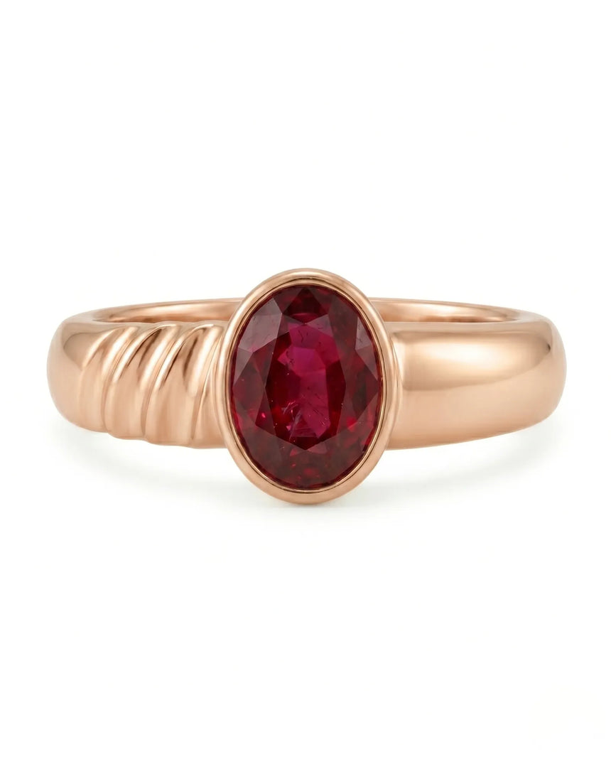 Luxury ruby solitaire ring in 18K rose gold with contemporary sculpted shoulders | SARATTI