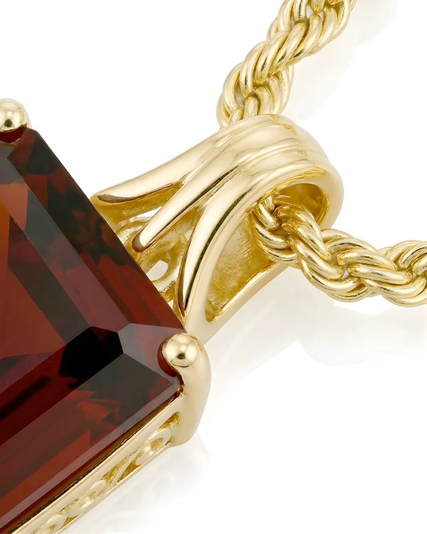 Luxury unisex garnet necklace in 18K Yellow Gold with bold natural red center stone | SARATTI
