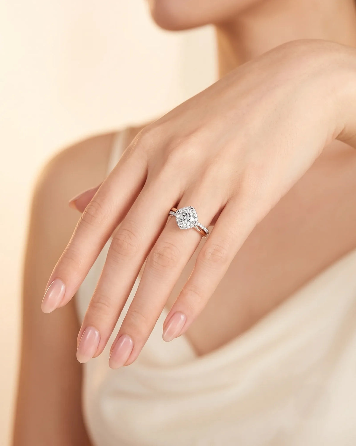 Renea – Majestic Grace Natural Round Diamond Two-Tone Halo Ring