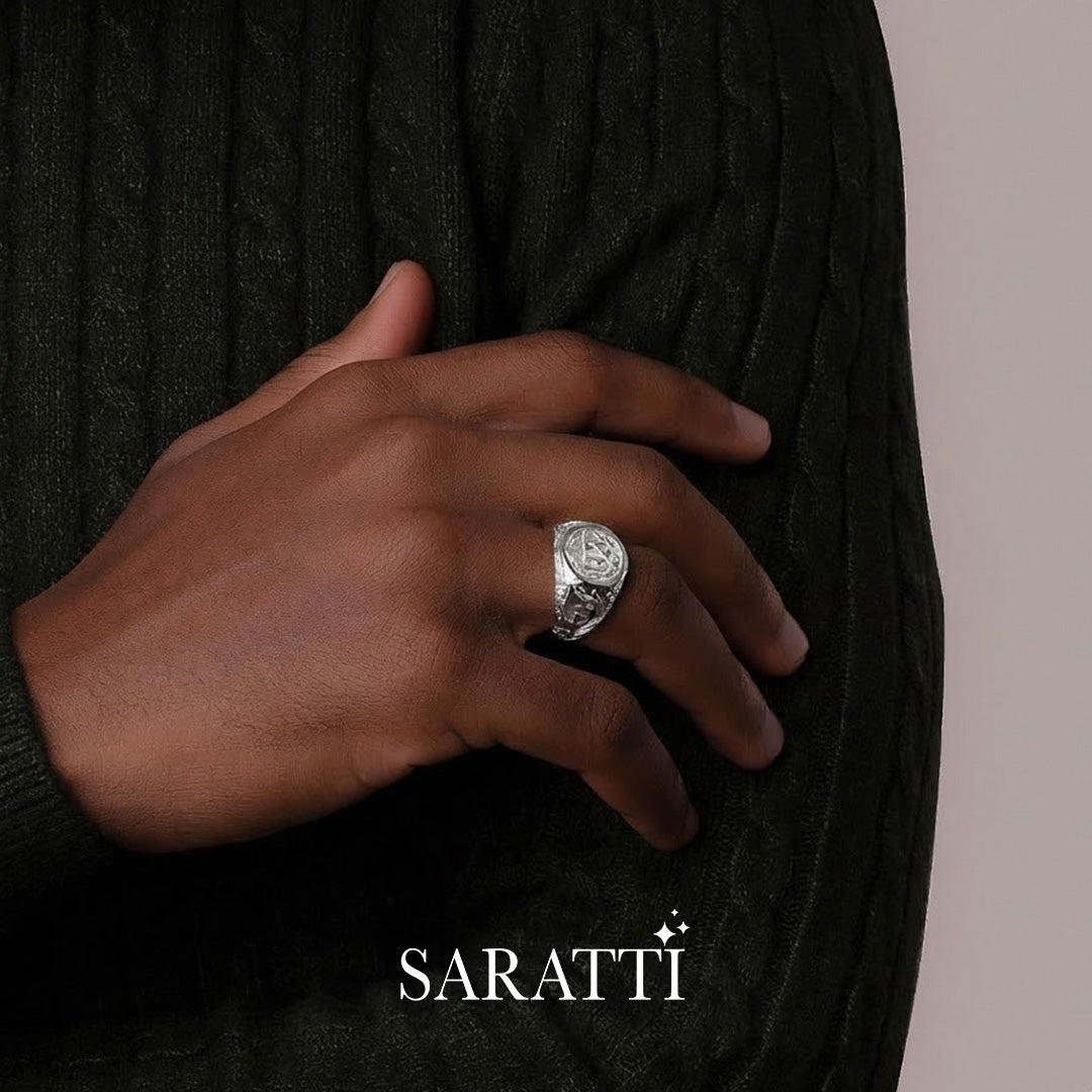 Mens initial ring worn on model in platinum | SARATTI