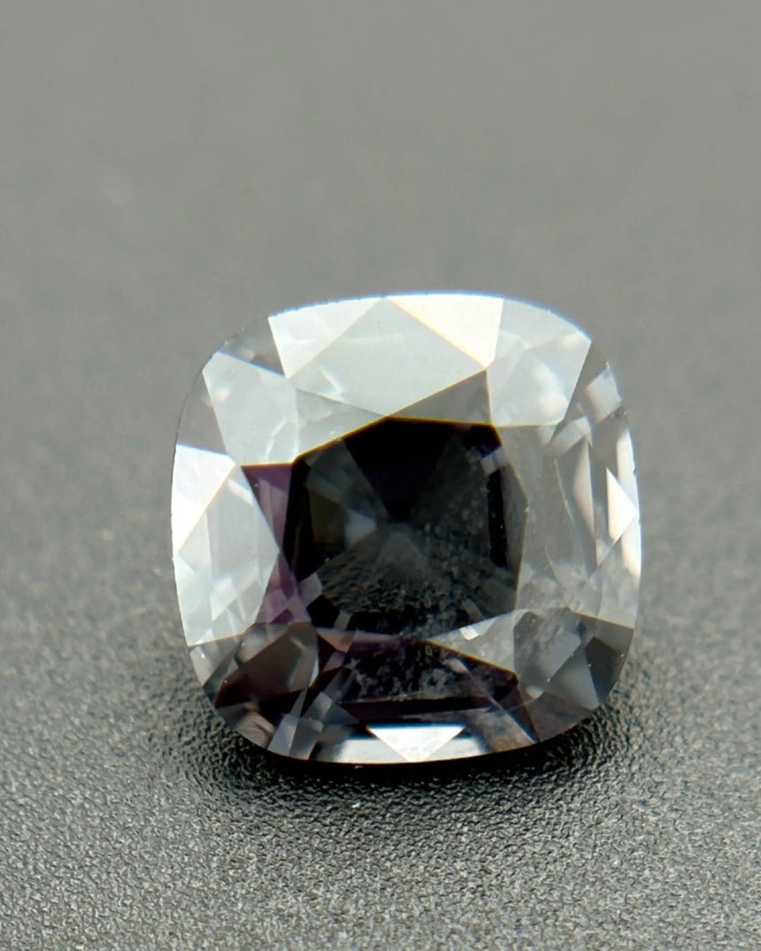 Metallic Gray Spinel cushion top view with broad facets | SARATTI
