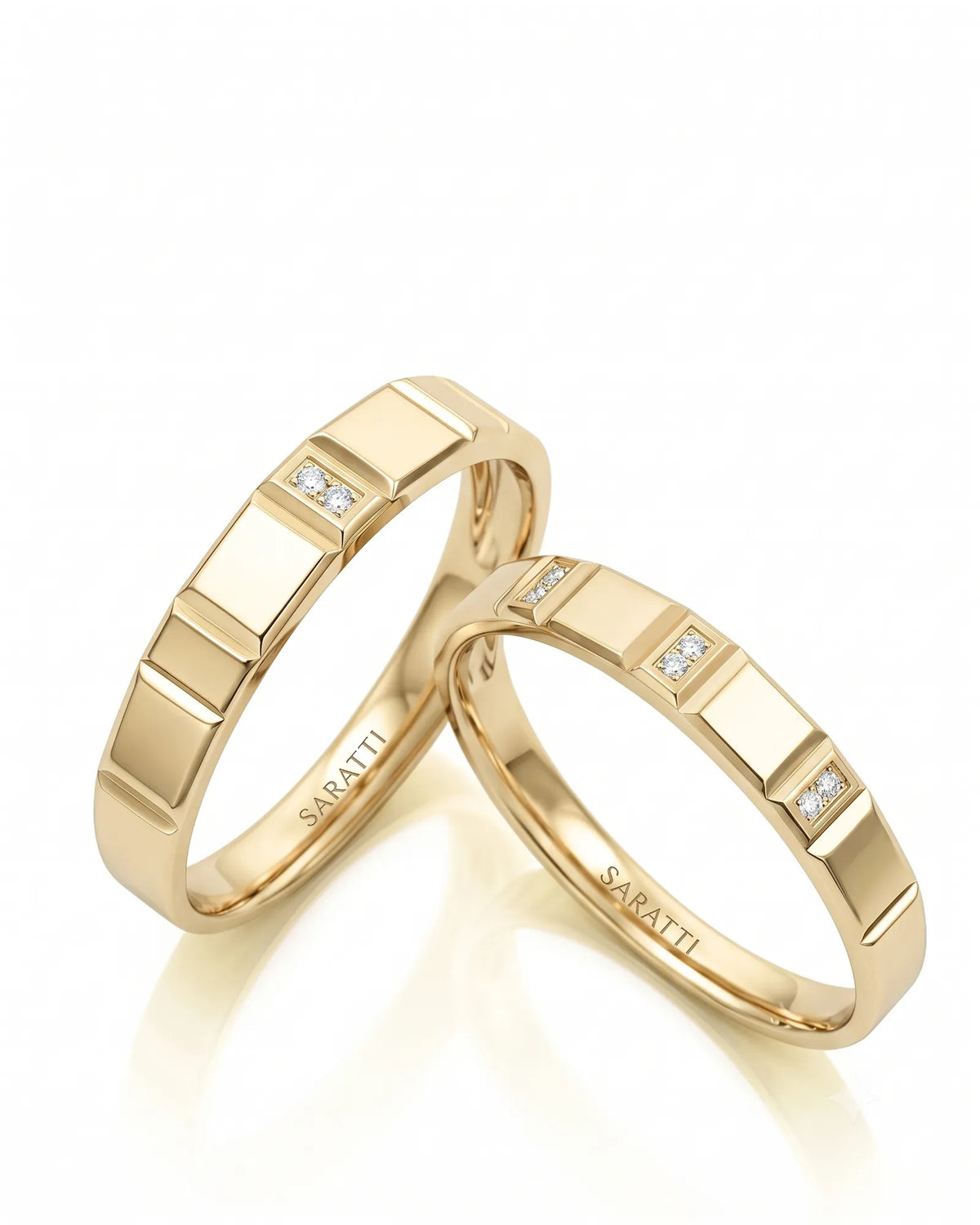 Midnight matching diamond wedding rings with refined polished design in 18K yellow gold | SARATTI