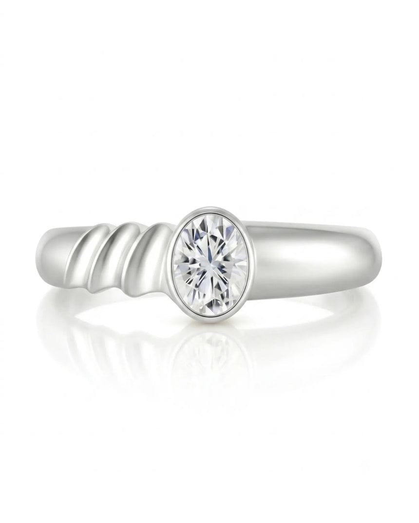 Modern bezel set moissanite ring with triple wave shank in polished platinum | SARATTI