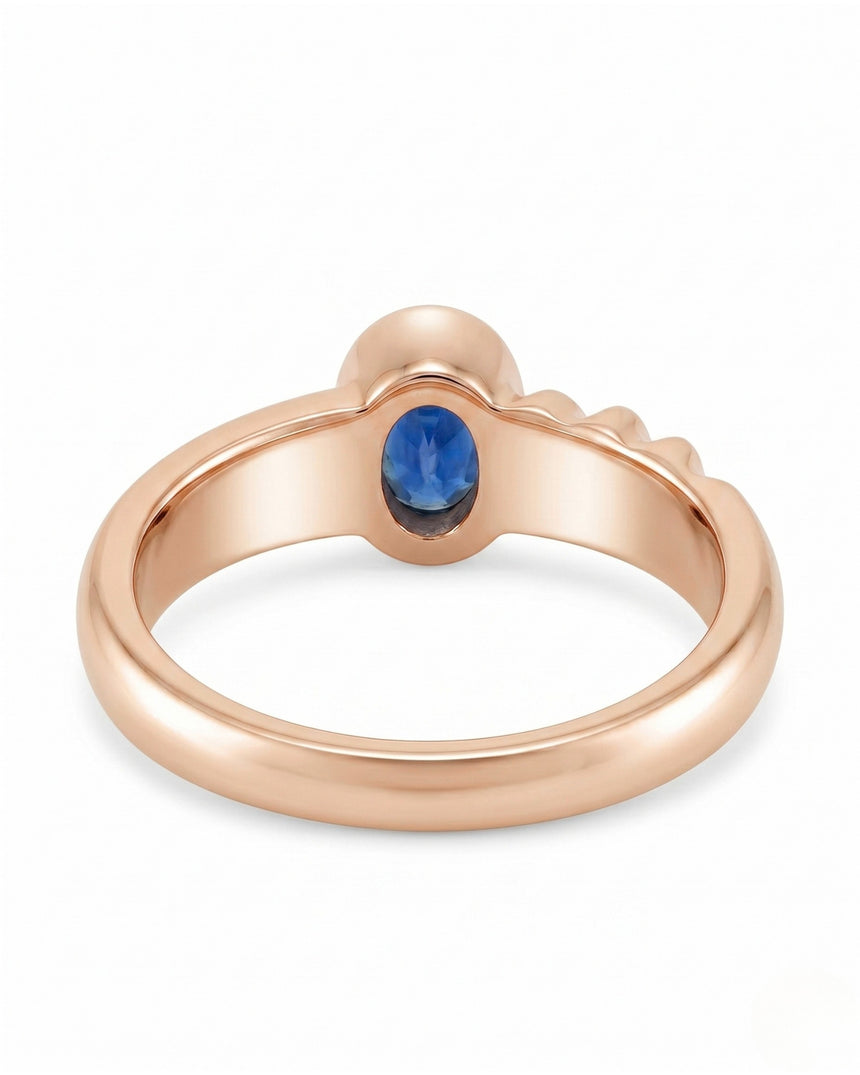 Modern oval sapphire ring with sculptural groove detail in polished 18K Rose Gold | SARATTI