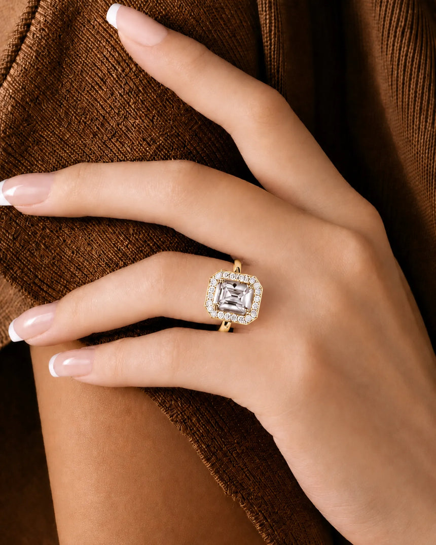 Modern radiant moissanite engagement ring with halo accents in polished 18K yellow gold - SARATTI