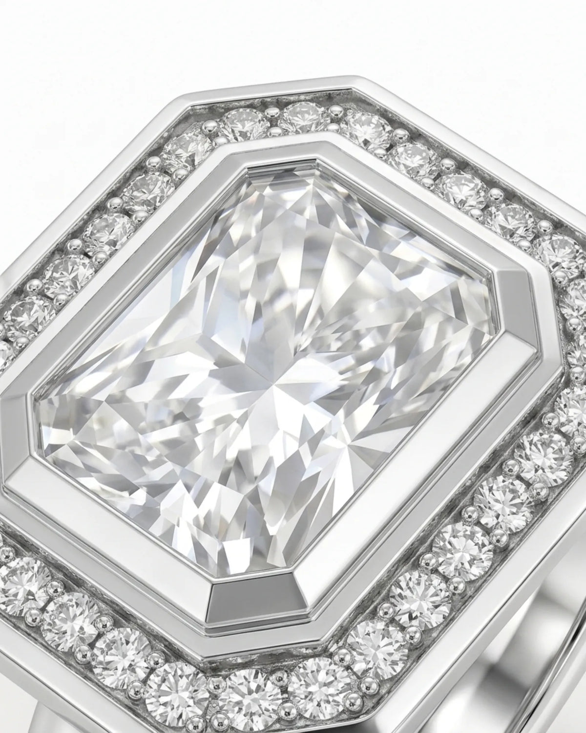 Modern radiant moissanite engagement ring with halo accents in polished platinum | SARATTI