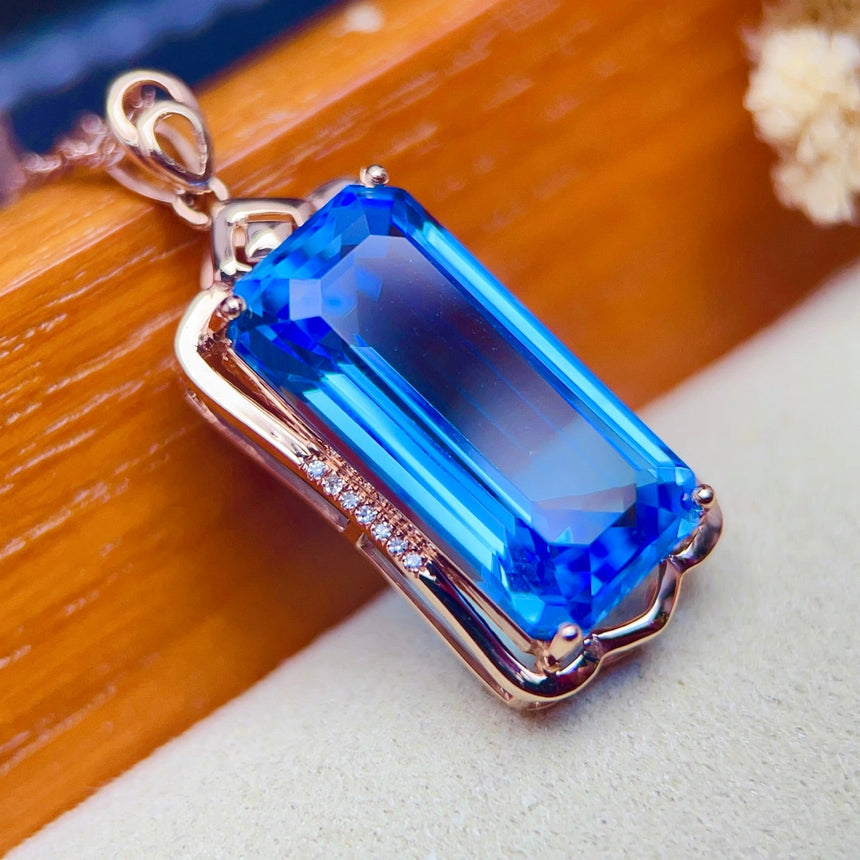 Natural Blue Topaz Oval Pendant with Diamond Accents | SARATTI