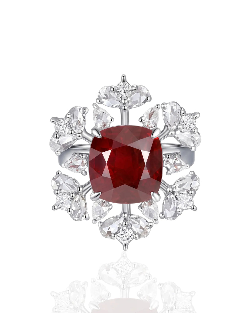 Natural cushion ruby ring with blooming diamond halo and pavé white gold setting | SARATTI