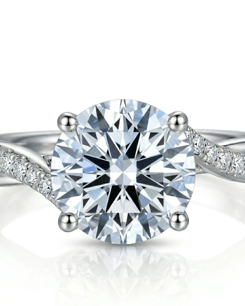 Natural diamond ring with round brilliant center stone and sculpted platinum split shank | SARATTI