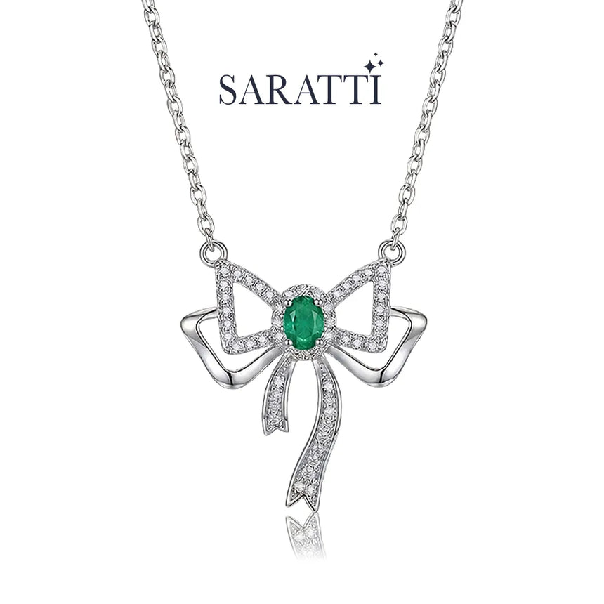 Natural emerald necklace with bow-inspired pendant design | SARATTI