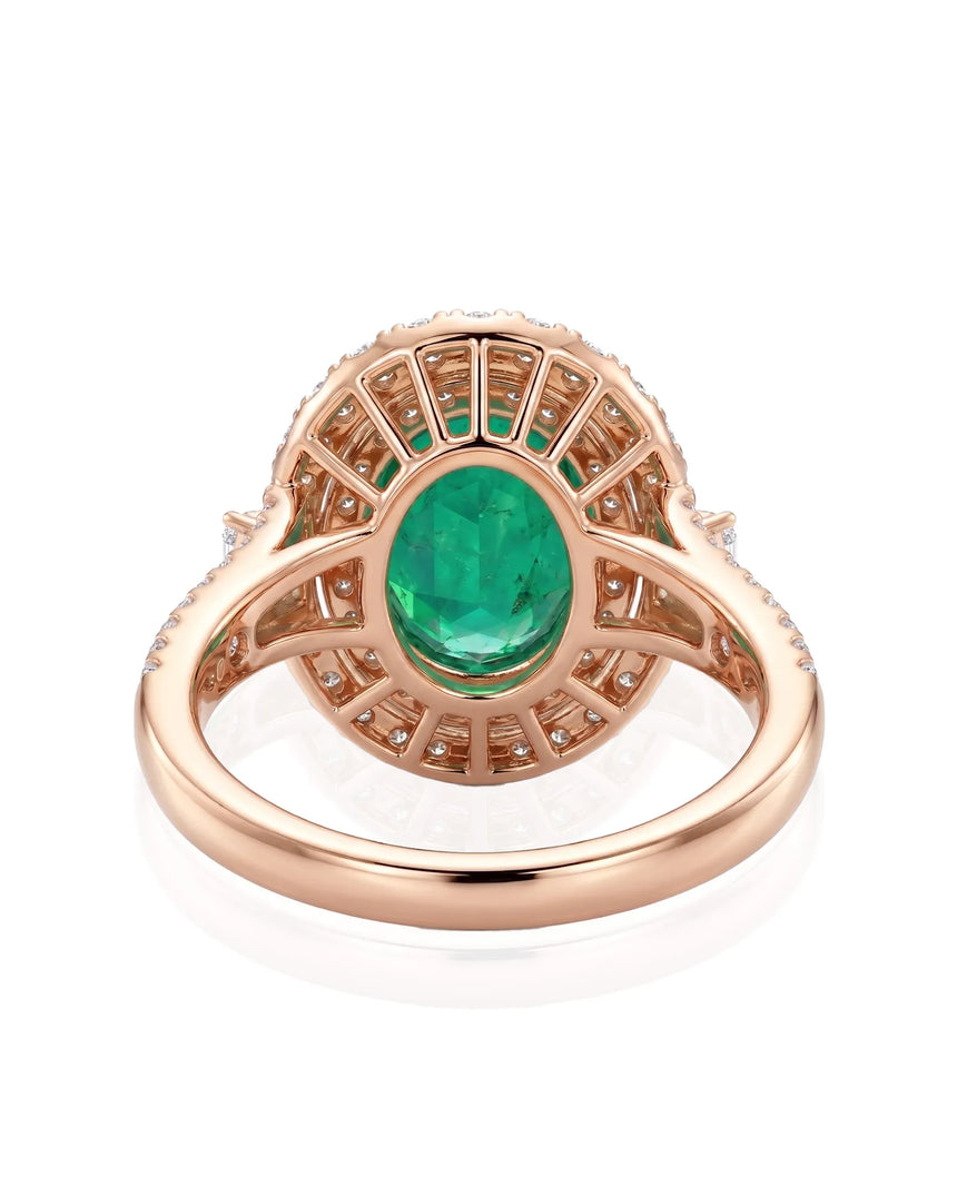 Natural emerald ring with diamond halo and split arc band in 18K rose gold | SARATTI