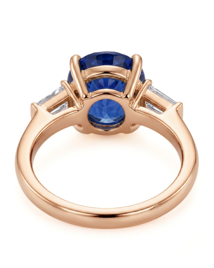 Natural oval blue sapphire ring with side baguette diamonds in 18K rose gold | SARATTI