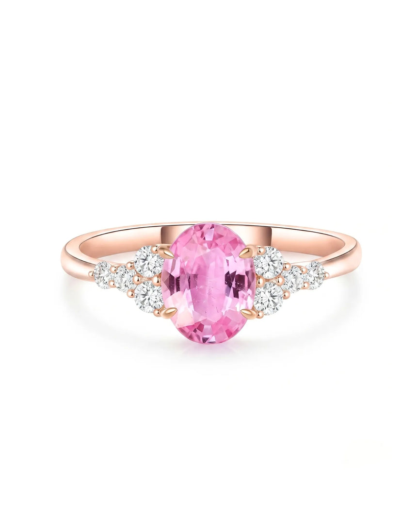 Natural oval pink sapphire ring with sparkling round diamonds in 18K rose gold | SARATTI