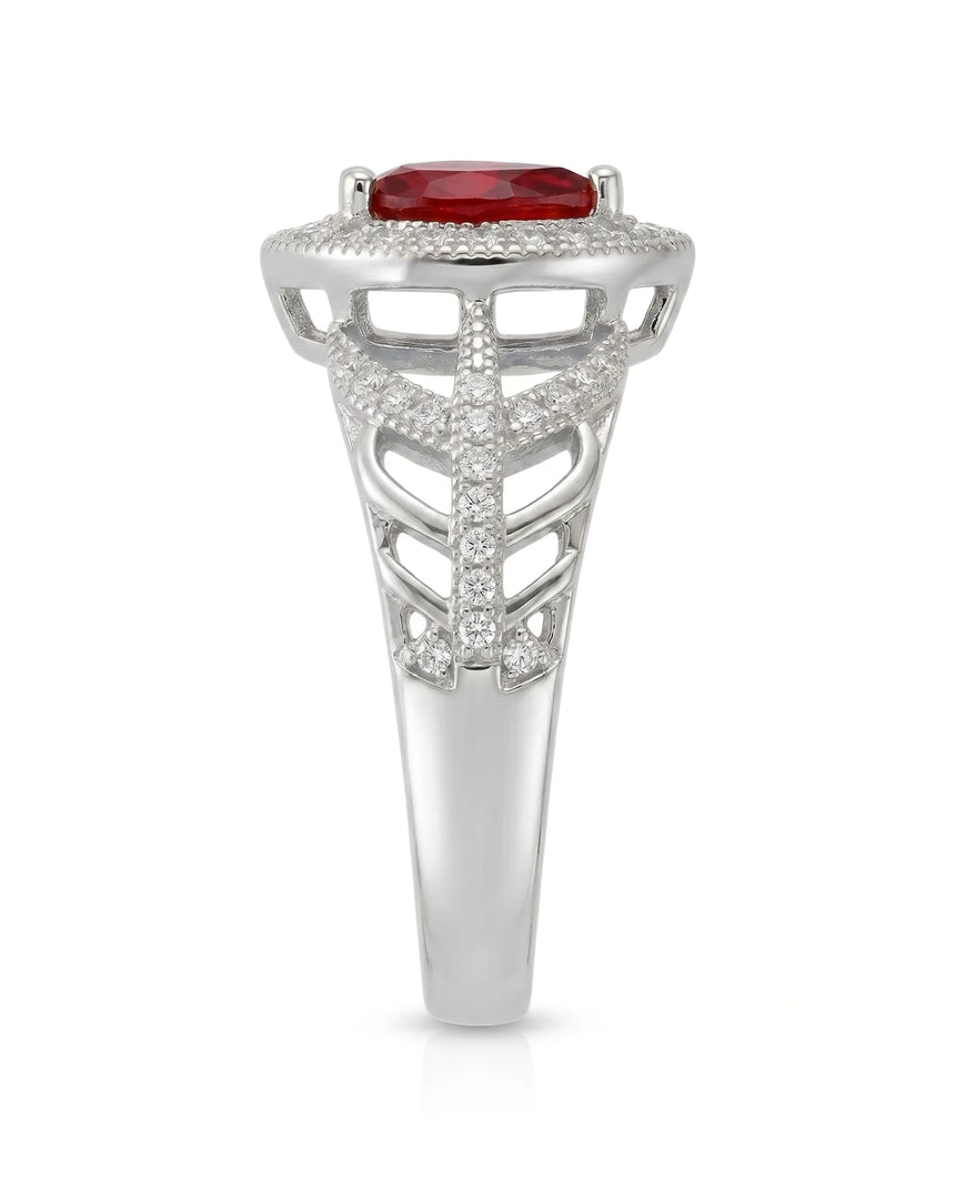 Natural pear ruby ring with bright diamond halo and white gold setting - SARATTI