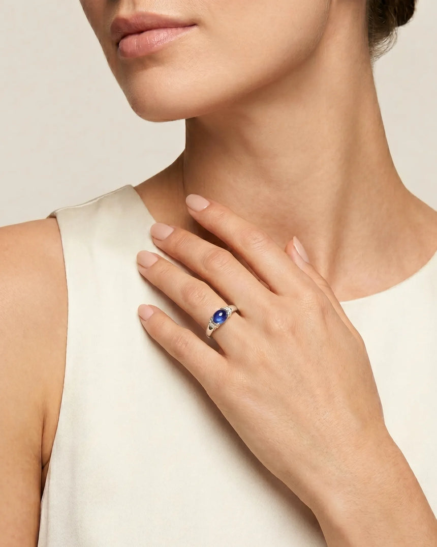 Natural royal blue sapphire ring with round diamond details in 18K white gold | SARATTI