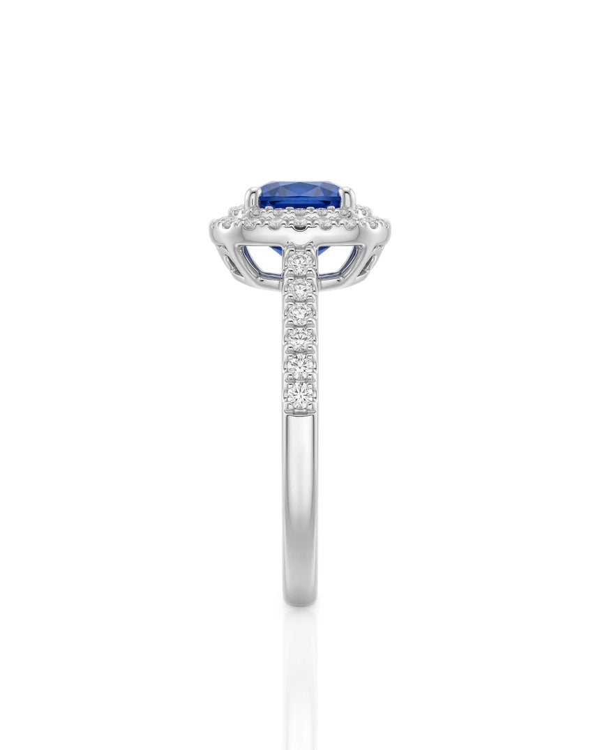 Natural unheated blue sapphire ring with round diamond accents in platinum | SARATTI