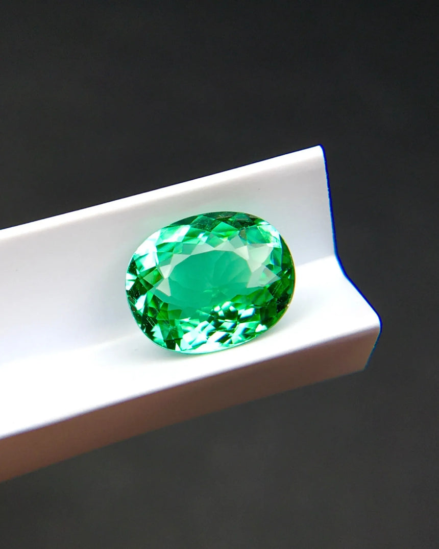 Neon Bluish Green Tourmaline oval alternate angle | SARATTI