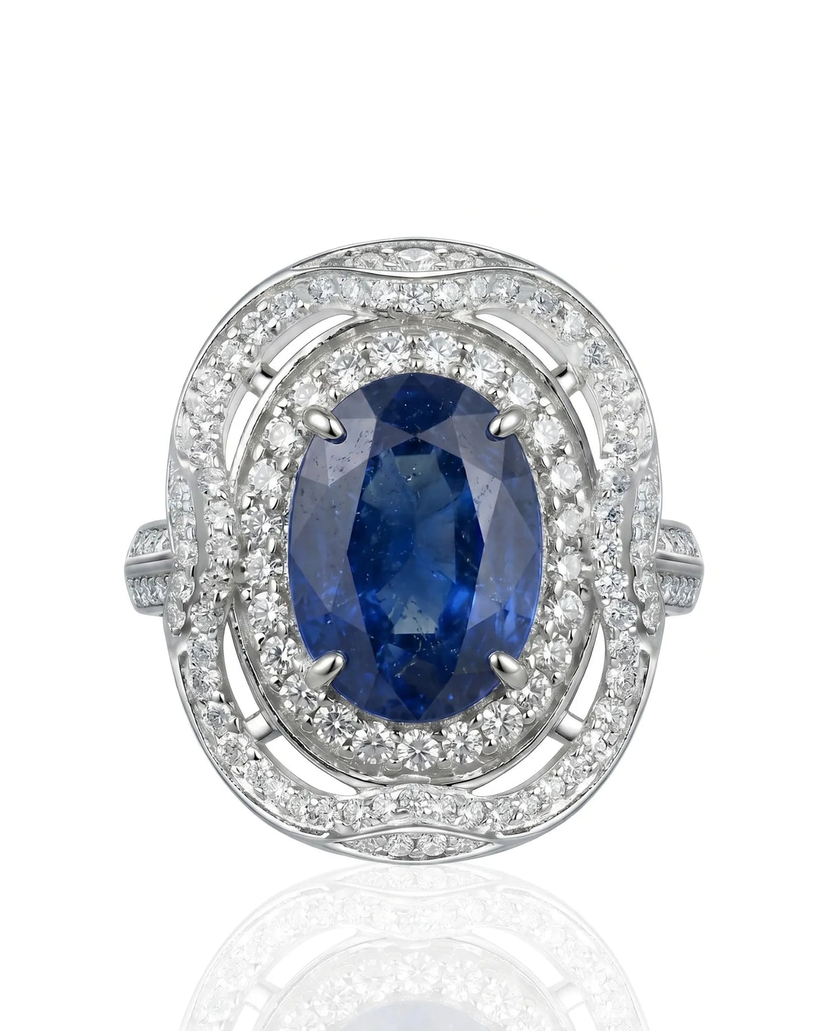 Open-work sapphire ring with layered round diamond halos in refined platinum | SARATTI