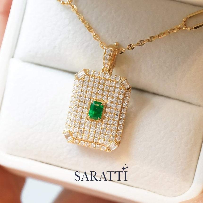 18K gold pavillion pendant with emerald center and structured diamond detailing | SARATTI