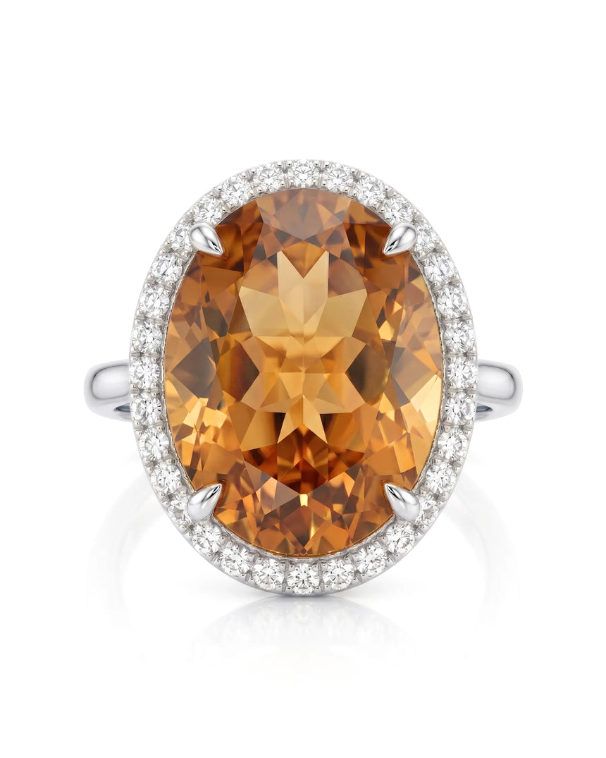 Oval Imperial Topaz diamond halo ring in white gold setting | SARATTI