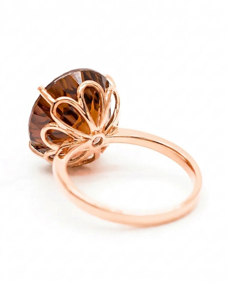 Oval Imperial Topaz solitaire ring with open floral basket and romantic 18K rose gold band | SARATTI