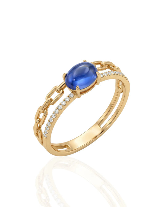 Oval blue sapphire Cuban chain ring with channel set diamonds in 18K yellow gold | SARATTI