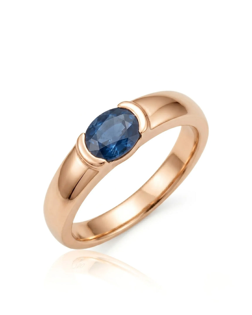 Oval blue sapphire ring with modern bezel setting in 18K rose gold | SARATTI