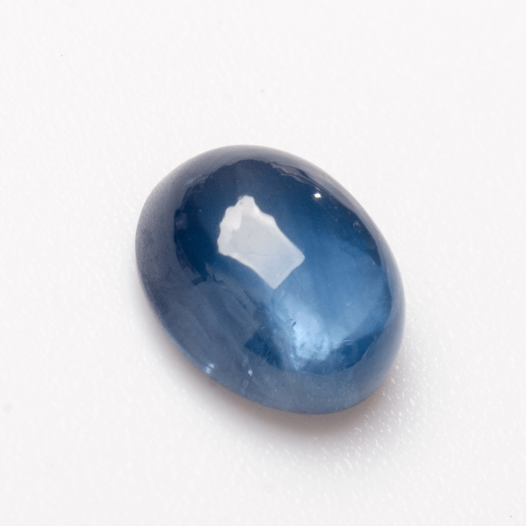 Oval cabochon sapphire loose stone in rich blue tones, 5.8 × 4.8 mm | SARATTI