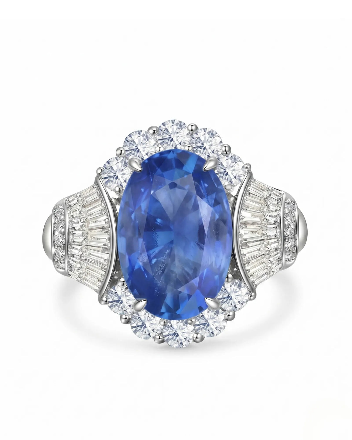 Oval cornflower blue sapphire ring with brilliant diamond halo in enduring platinum | SARATTI