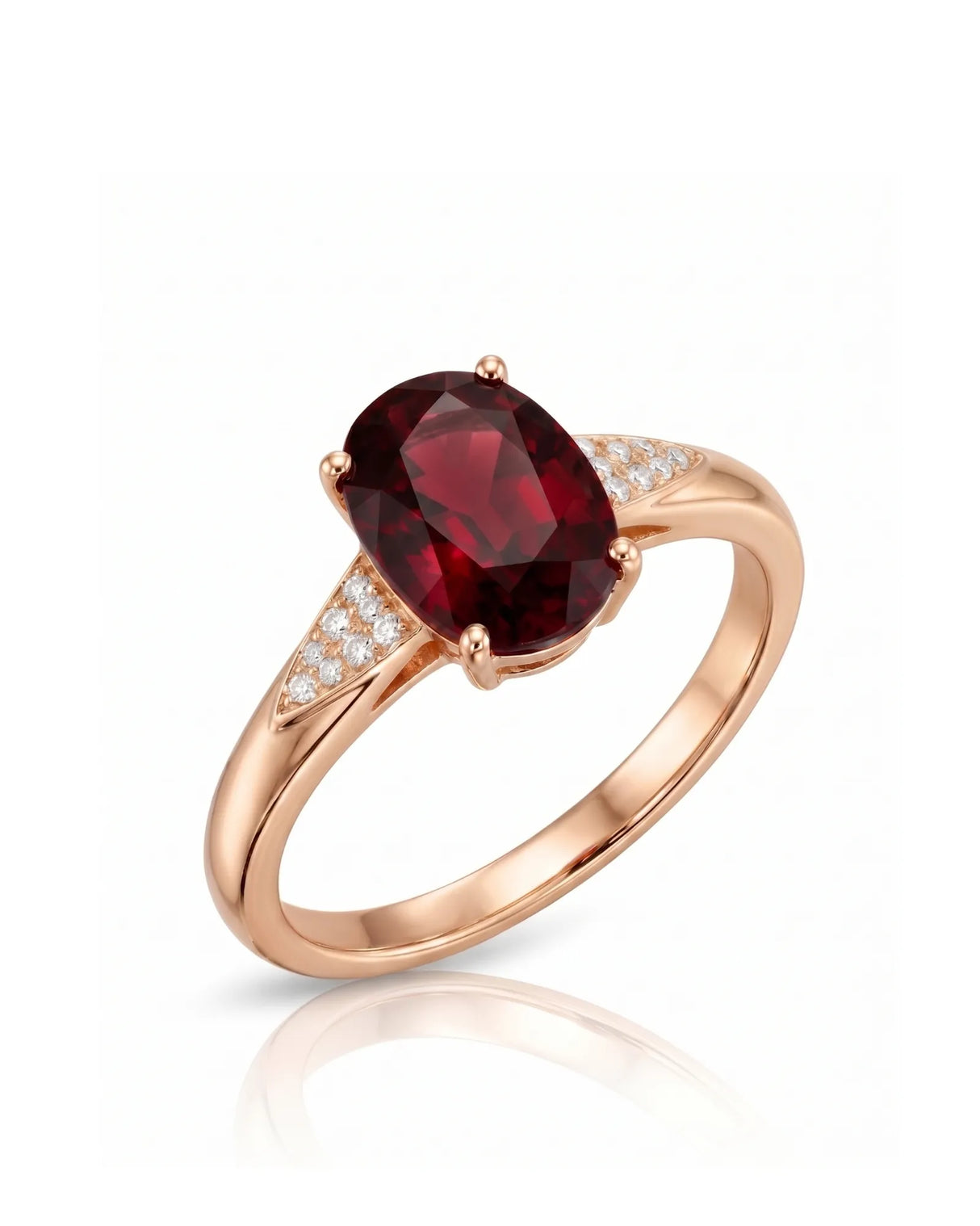 Oval deep red garnet ring with tapered diamond shoulders in 18K rose gold | SARATTI