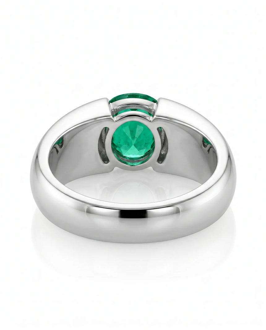 Oval emerald solitaire signet ring in 18K white gold | SARATTI